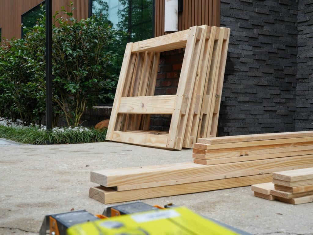 Impact Day 2026: Building More Than Beds 13 Completed wooden bed frames built by Legacy Construction and Development volunteers at Legacy Day 2026, donated to children survivors of human trafficking